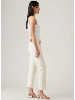 Dżinsy - Slim fit - w kolorze kremowym