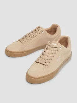 Skórzane sneakersy w kolorze beżowym