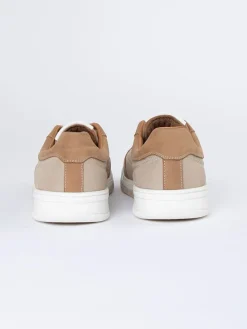 Skórzane sneakersy w kolorze beżowym