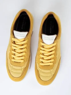 Skórzane sneakersy w kolorze żółtym